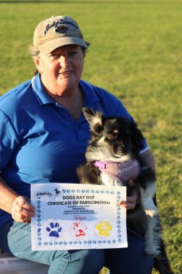 Woman Holding Certificate of Participation